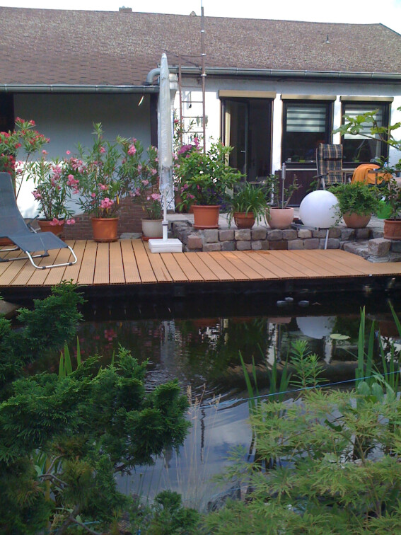 Gartengestaltung mit Terrasse und Teichbau