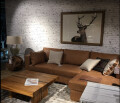 Gemütliche Sofa und Sessel und dazu passende Deko.